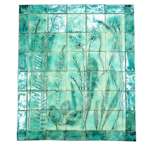 Handmade turquoise blue bathroom tiles with floral pattern