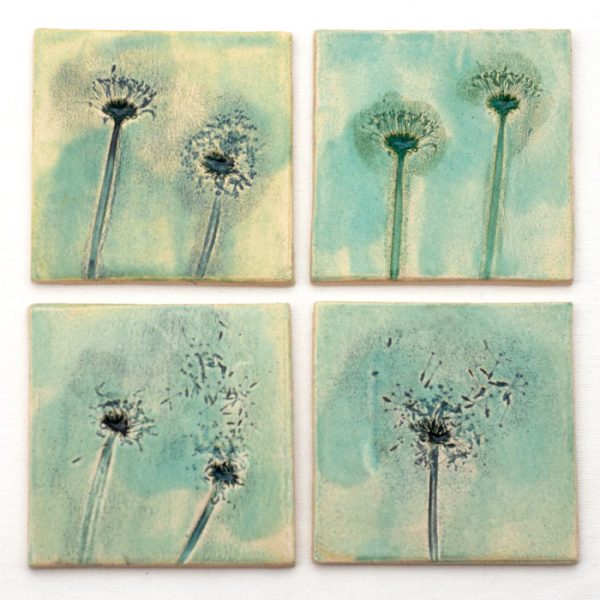 Handmade turquoise green kitchen tiles with floral pattern